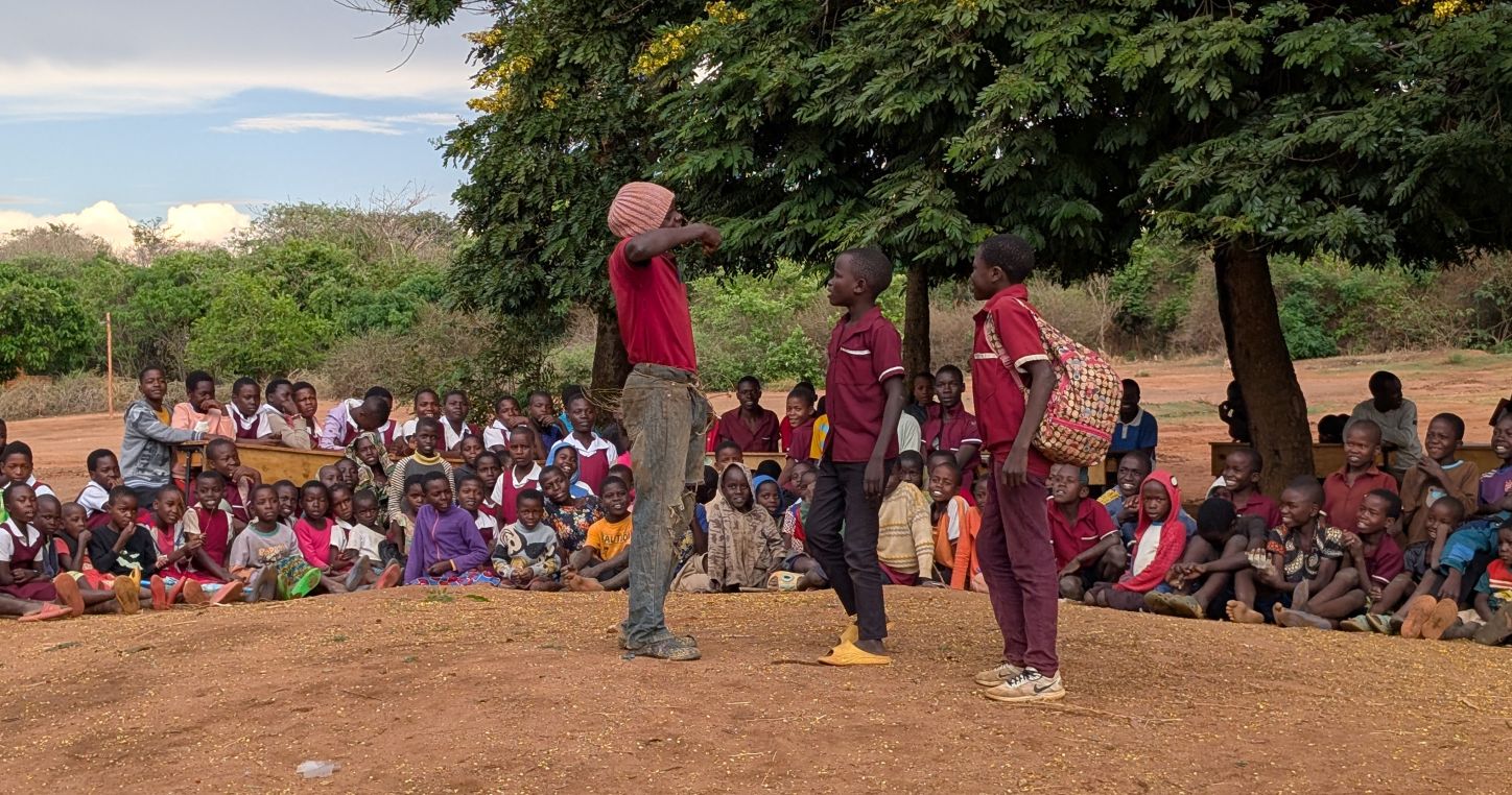 Street theatre performed by students to raise awareness of the negative impact of child labour | Malawi 2024